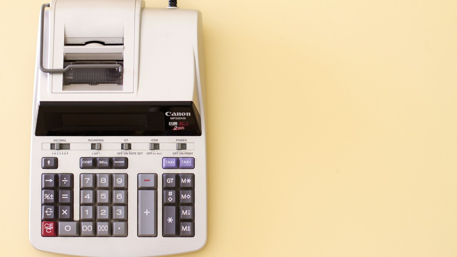 Printing calculator used to work out cost basis