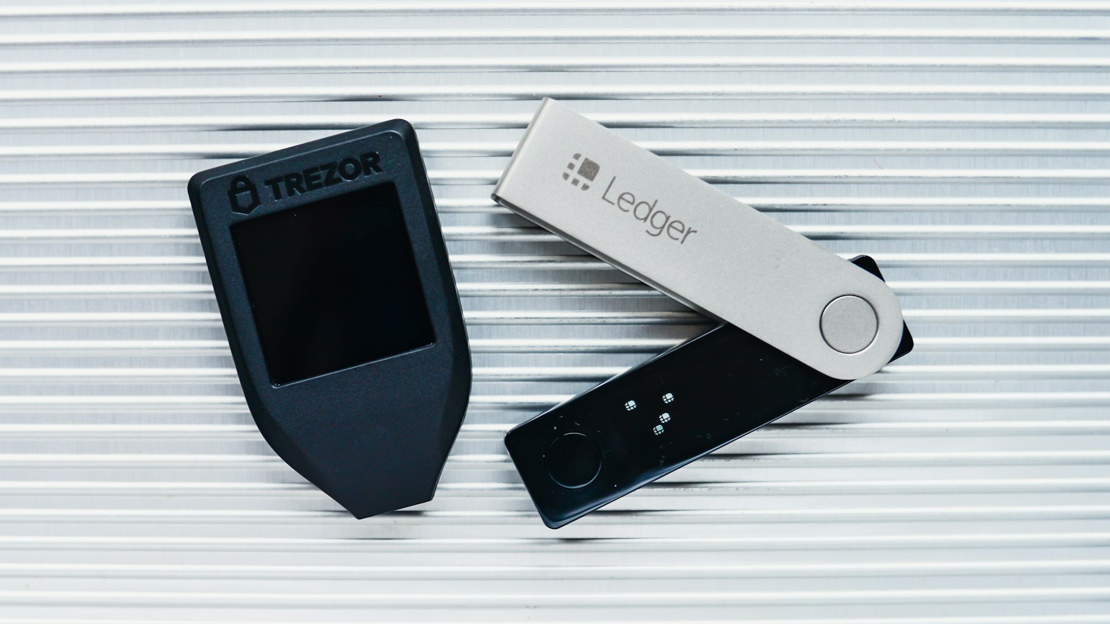 Two crypto hardware wallets side by side